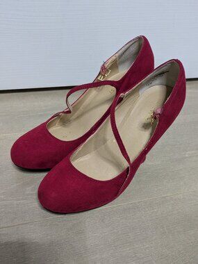 Worn out red 5" heels